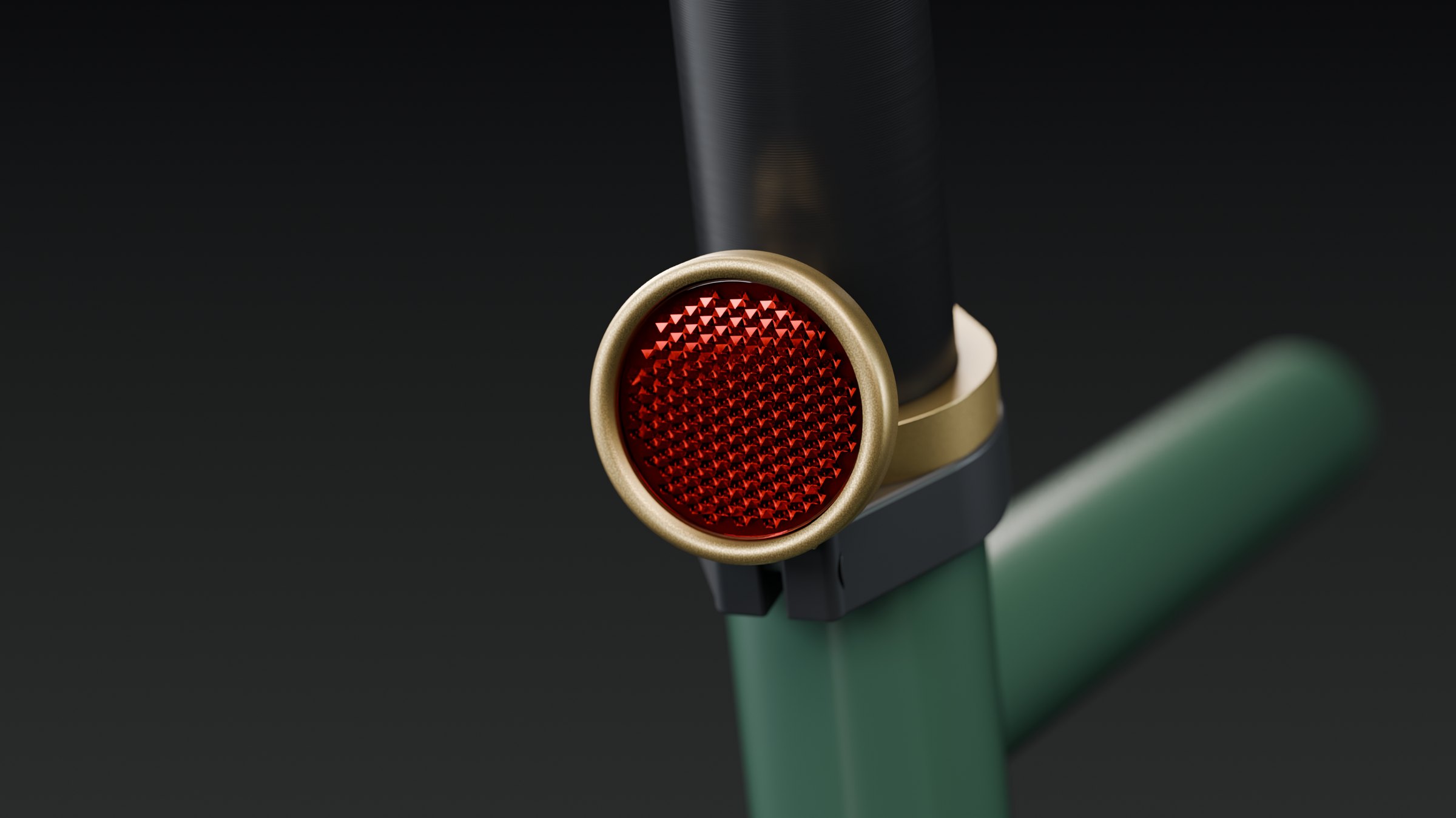 Brass collar with its round red reflector pod, clamped to the seatpost of a green bicycle frame